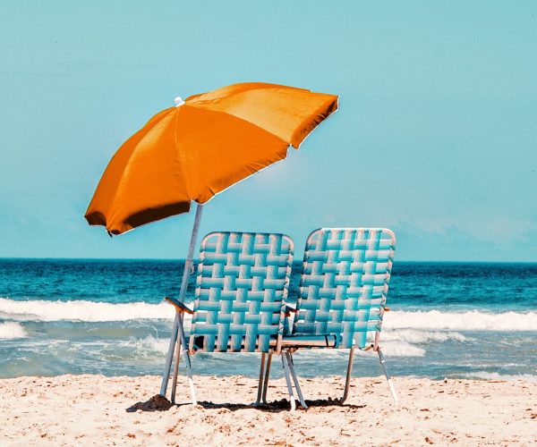 Umbrella And Chairs On The Beach